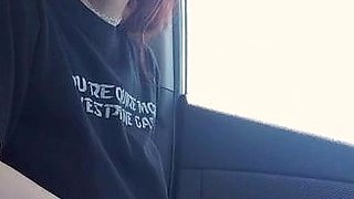 Outdoor solo masturbation scene with curly blonde