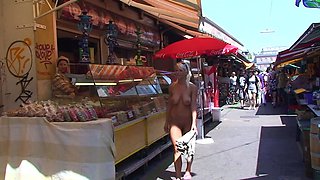 Blonde is flashing her big boobs in the outdoors