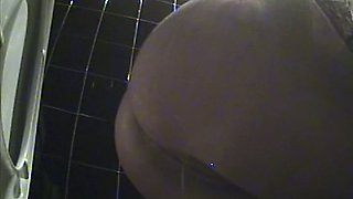 Chunky big white booty of an amateur woman in the toilet
