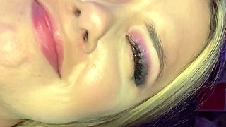 Gives handjob to a big cock