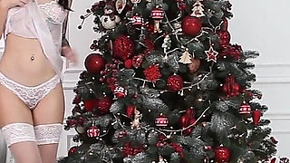 Adel’s Naughty Santa Hat Tease