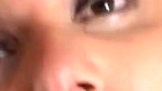 Brunette plays with dildo