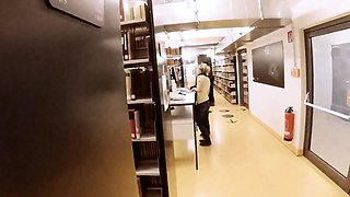 Two sexy white girls suck a huge black cock in the library
