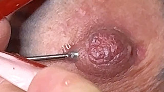 MILF Changes Her Nipple Piercing - Intimate, Confident & Captivating!