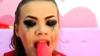 Cam Girl Deep Throats Dildo in Bondage