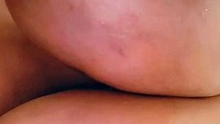 Busty curly brunette with big boobs fucks on couch