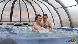 Old4k. senior man tenderly fucks stunning dark haired after relax in the jacuzzi