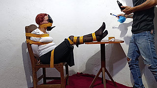 Tied with Plastic Tape Gagged with a Heel on the Face and Being Masturbated with a Toy
