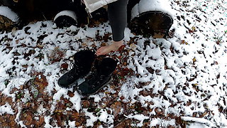 Slapping and pulling her labia in the snow