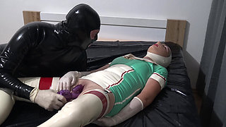 Hot Latex Nurse Got an Orgasm with a Purple Toy He Was Playing