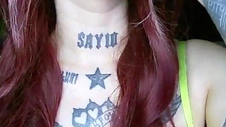 Sexy Alternative Redhead Drinking Soda and Burping