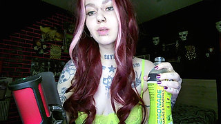 Sexy Alternative Redhead Drinking Soda and Burping