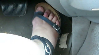 Pedal Pushing Nurse Vicki works her car pedals  in sandals