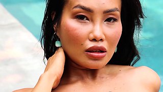 Asian Viviane slips out of her bikini