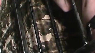 Dominating pussy plays in the cage