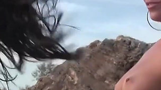 Three Girls in Bikinis on a Mountain Top Get Naked and Play with Each Other