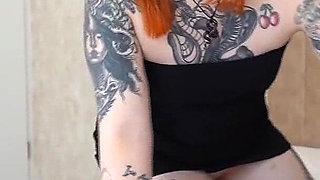A Dominant Redhead Shows No Mercy to Her Tied-up Slave