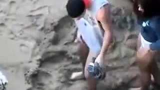 Wild brunette girlfriend gets banged doggystyle on the beach