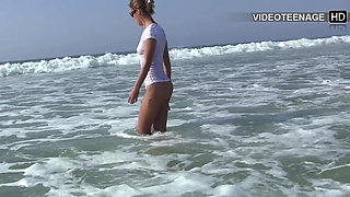 Lovely 18 Year Brunette Sunbathes Naked on the Beach