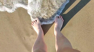Topless at the beach walking and naked pee
