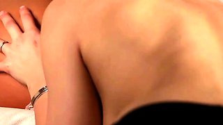 Two black-haired Asian chicks kissing and oral sex