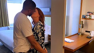 Hot redhead riding two big cocks