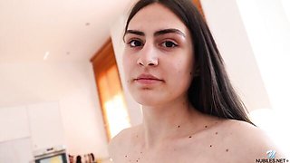 Small-tit young brunette Megumi sensually plays with her hungry crack