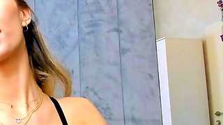 Blonde teen in solo action with her pussy