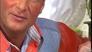 Vintage brunette beauty indulges in daring passion with timeless allure