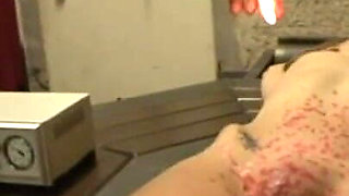 Petit girl stretching, candle dripping