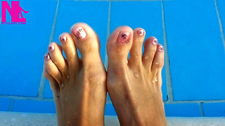 Barefoot Dangling in Swimming Pool Water