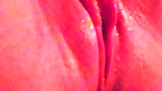 Muscular milf jerks off her big clit and pumps juice from horniness