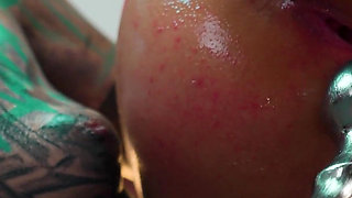 Oiled up Lesbians Share a Metal Toy