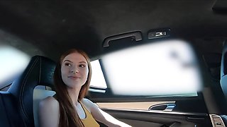 Adorable young redhead stuffed full of cock in the car