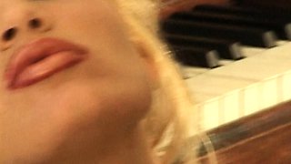 Blonde and brunette lesbian babes kiss